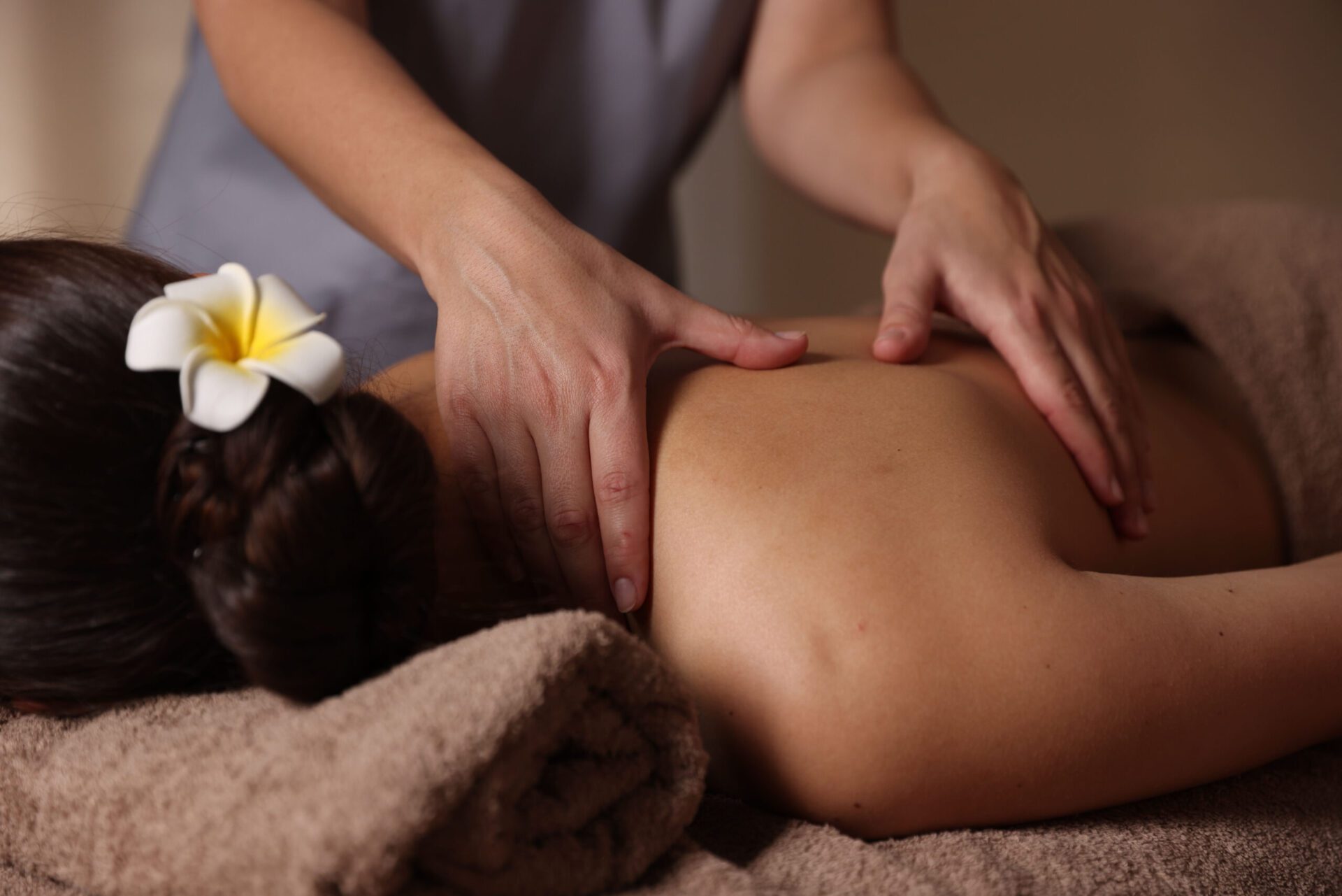 Woman receiving back massage in spa salon, closeup Deep tissue massage
